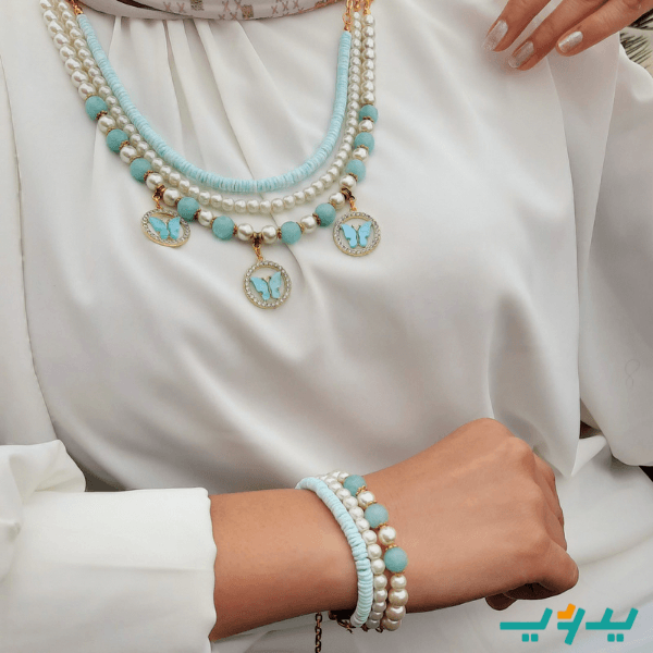 طقم فراشه بالفيروز - مطلي بماء الذهب