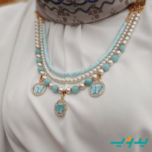 طقم فراشه بالفيروز - مطلي بماء الذهب